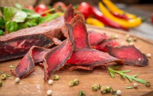 Basturma is an air-dried, highly seasoned smoked beef.